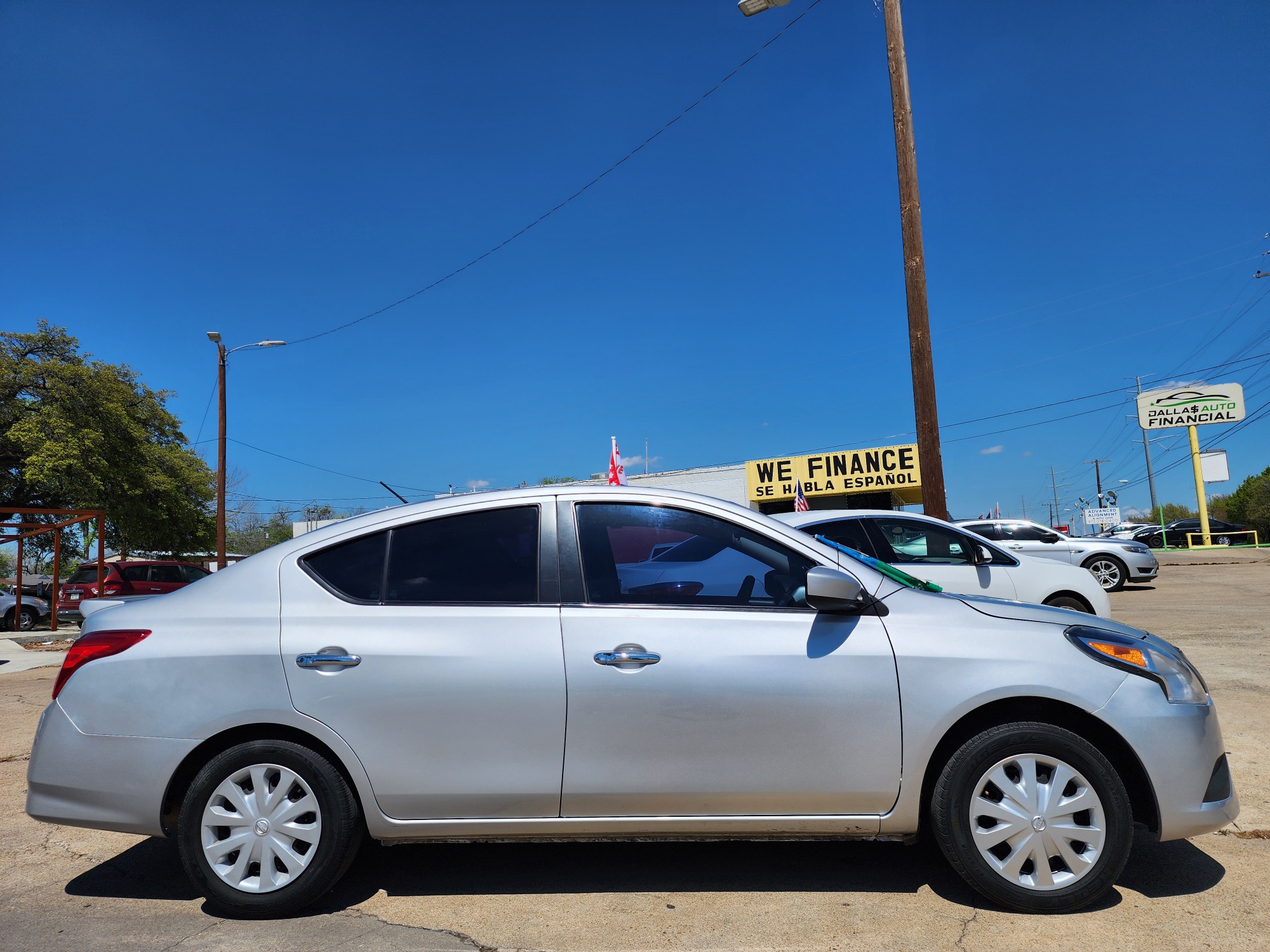 2018 SILVER Nissan Versa SV (3N1CN7AP7JK) with an 1.6L L4 DOHC 16V engine, CVT transmission, located at 2660 S.Garland Avenue, Garland, TX, 75041, (469) 298-3118, 32.885551, -96.655602 - Welcome to DallasAutos4Less, one of the Premier BUY HERE PAY HERE Dealers in the North Dallas Area. We specialize in financing to people with NO CREDIT or BAD CREDIT. We need proof of income, proof of residence, and a ID. Come buy your new car from us today!! This is a SUPER CLEAN 2018 NISSAN VER - Photo #2